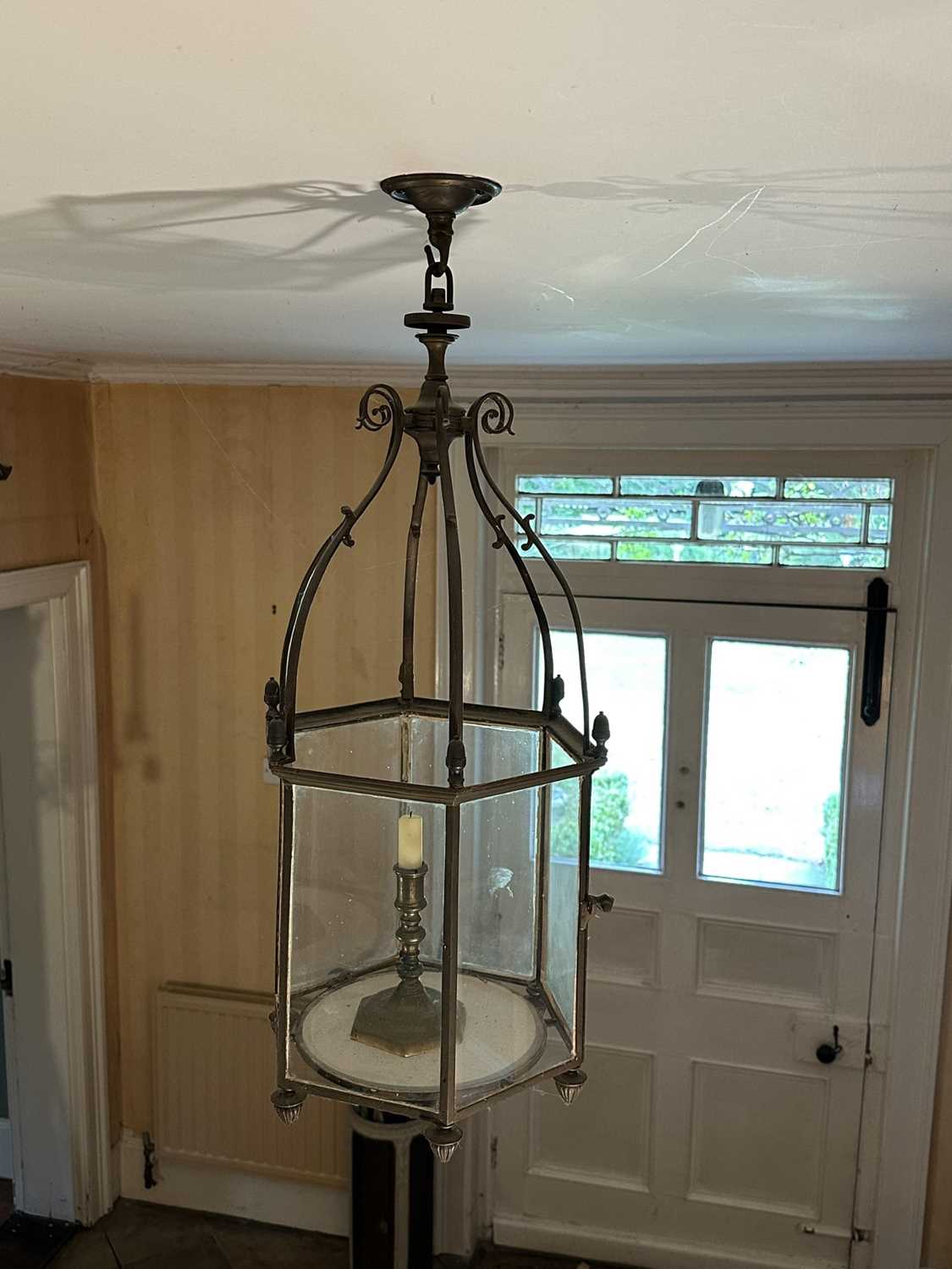 Lot 1507 - Good quality early 19th century brass hexagonal hall lantern with arched and scrolling supports