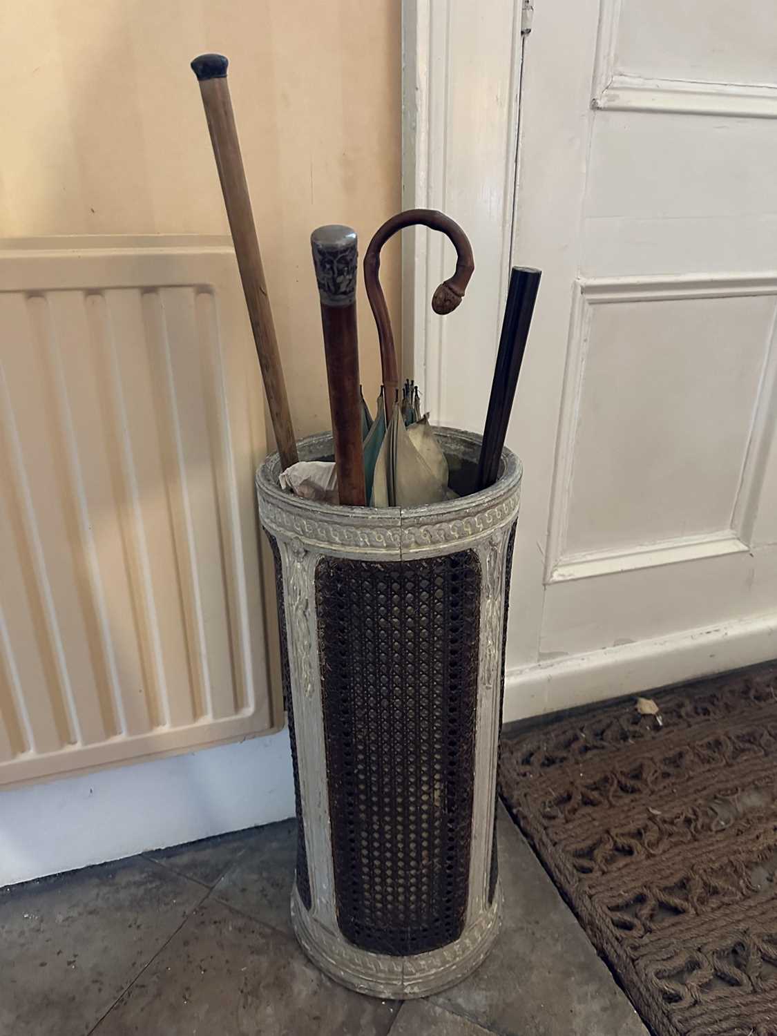 Lot 1508 - French painted and caned umbrella stand of cylindrical form. First half 20th century