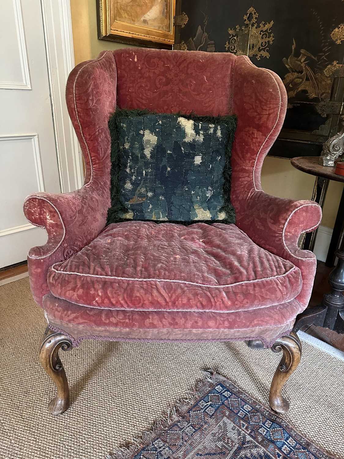 Lot 1523 - 19th century, George I style wing armchair, velvet upholstery, loose cushion, on carved cabriole legs