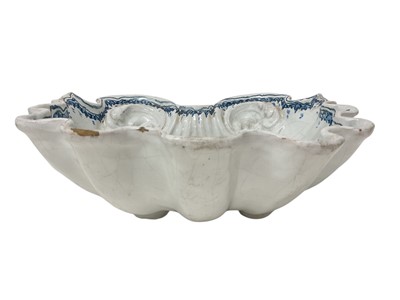 Lot 1525 - Large antique tin glazed scallop shell bowl