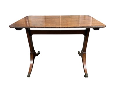 Lot 1526 - George IV mahogany table with shaped rectangular top above straight supports on splayed legs and brass capped castors, 91cm wide