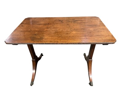 Lot 1526 - George IV mahogany table with shaped rectangular top above straight supports on splayed legs and brass capped castors, 91cm wide
