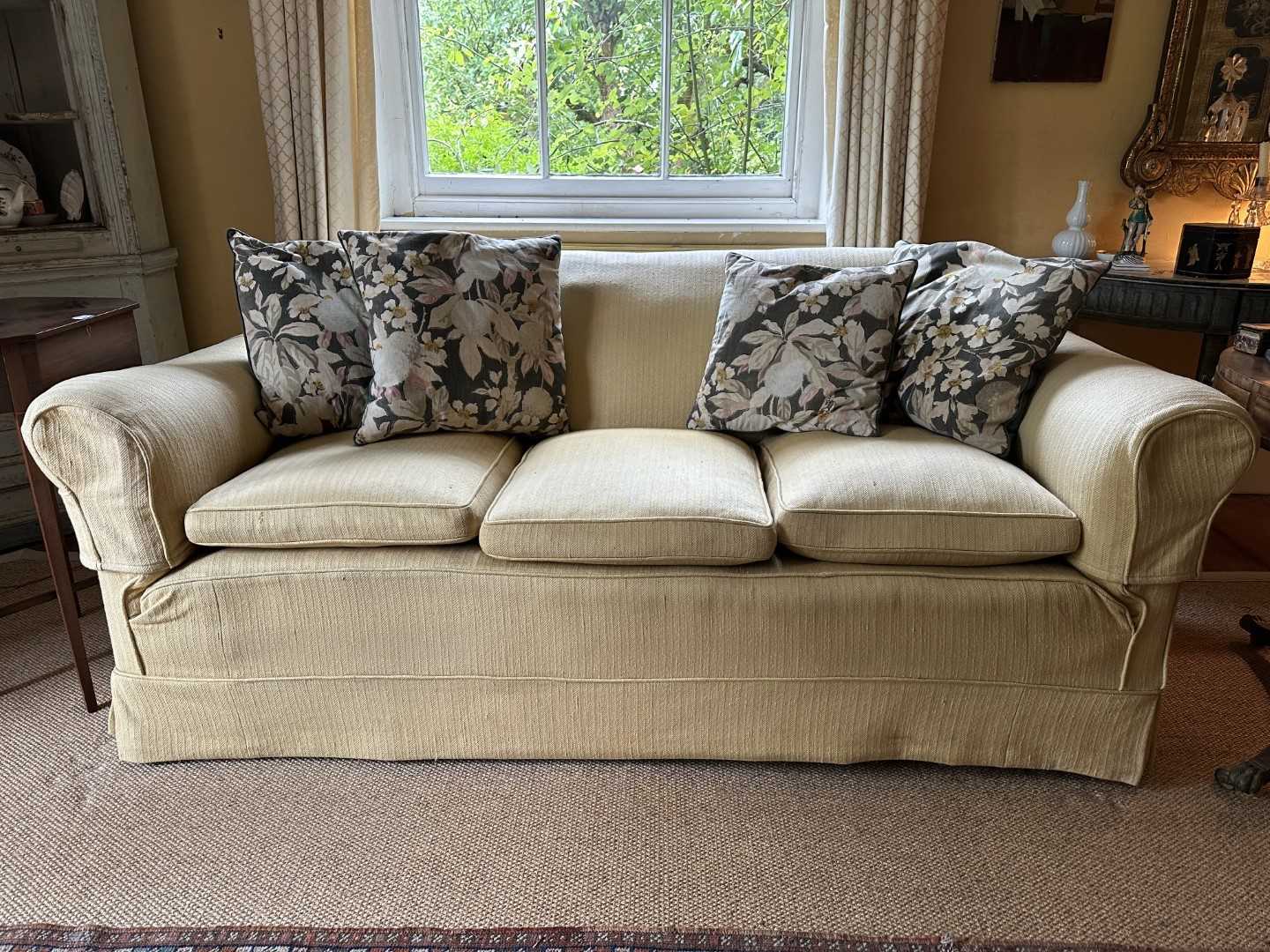 Lot 1528 - 1920s three seater country house sofa with yellow upholstery