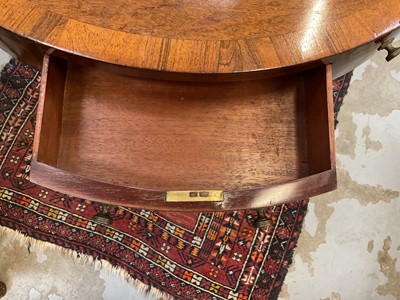 Lot 1529 - 19th century mahogany drum table with crossbanded top and an arrangement of drawers, on turned column and three splayed legs terminating on brass paw castors