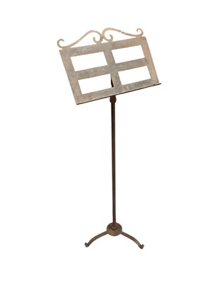 Lot 1614 - Antique metal adjustable music stand, on tripod base