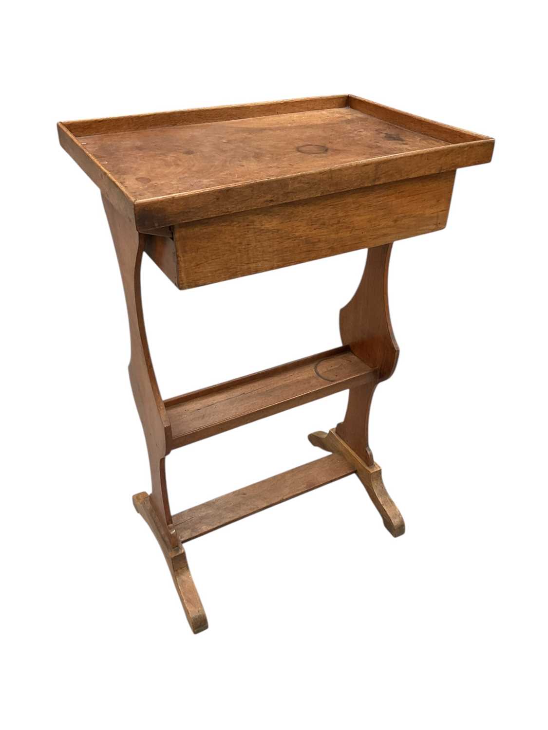 Lot 1616 - French walnut Tricoteuse table with rectangular top above a frieze drawer, on shaped end standards