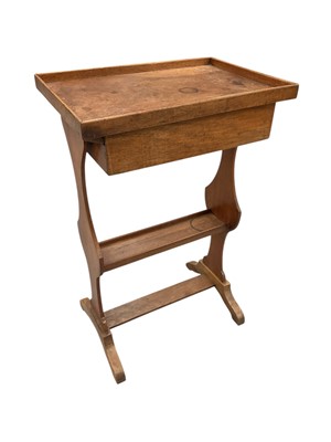 Lot 1616 - French walnut Tricoteuse table with rectangular top above a frieze drawer, on shaped end standards