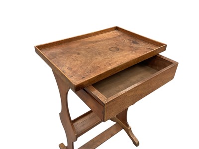 Lot 1616 - French walnut Tricoteuse table with rectangular top above a frieze drawer, on shaped end standards