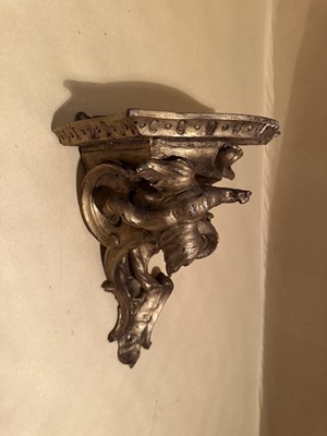 Lot 1567 - 18th century gilt bracket, the bowed platform above foliate scroll supports Provenance: Edward Hurst Antiques, Salisbury, 22nd June 1995