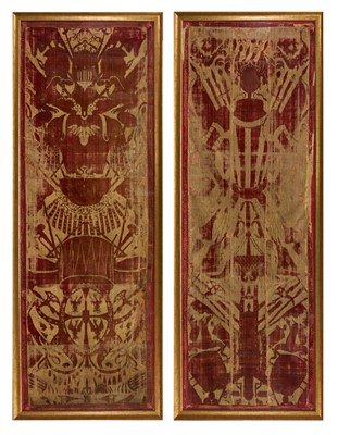 Lot 1573 - Pair of Italian late 17th / early 18th century cut velvet panels depicting trophies of arms, presented in glazed gilt frames