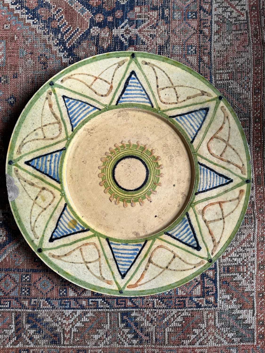Lot 1596 - Large pottery charger, 55cm diameter