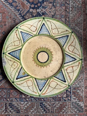Lot 1596 - Large pottery charger, 55cm diameter