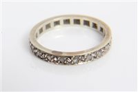 Lot 3483 - Diamond eternity ring, the full band of rose...