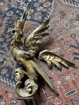 Lot 1553 - Mid 18th century carved giltwood ho ho bird, originally the cresting of a mirror