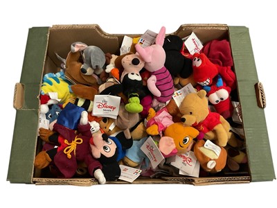 Lot 1740 - Disney Shop soft toys including bean bag Santa Eeyore 8", Chinese Mickey and Minnie, Dumbo 8", Bumble Bee Pooh 8", Jiminy Cricket 8",Goofy, Donald, King Louie 8" and many others (40+)