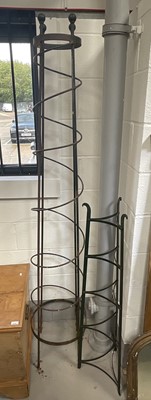 Lot 5229 - Wrought iron garden obelisk, 203cm high, and a Victorian iron pot stand (2)
