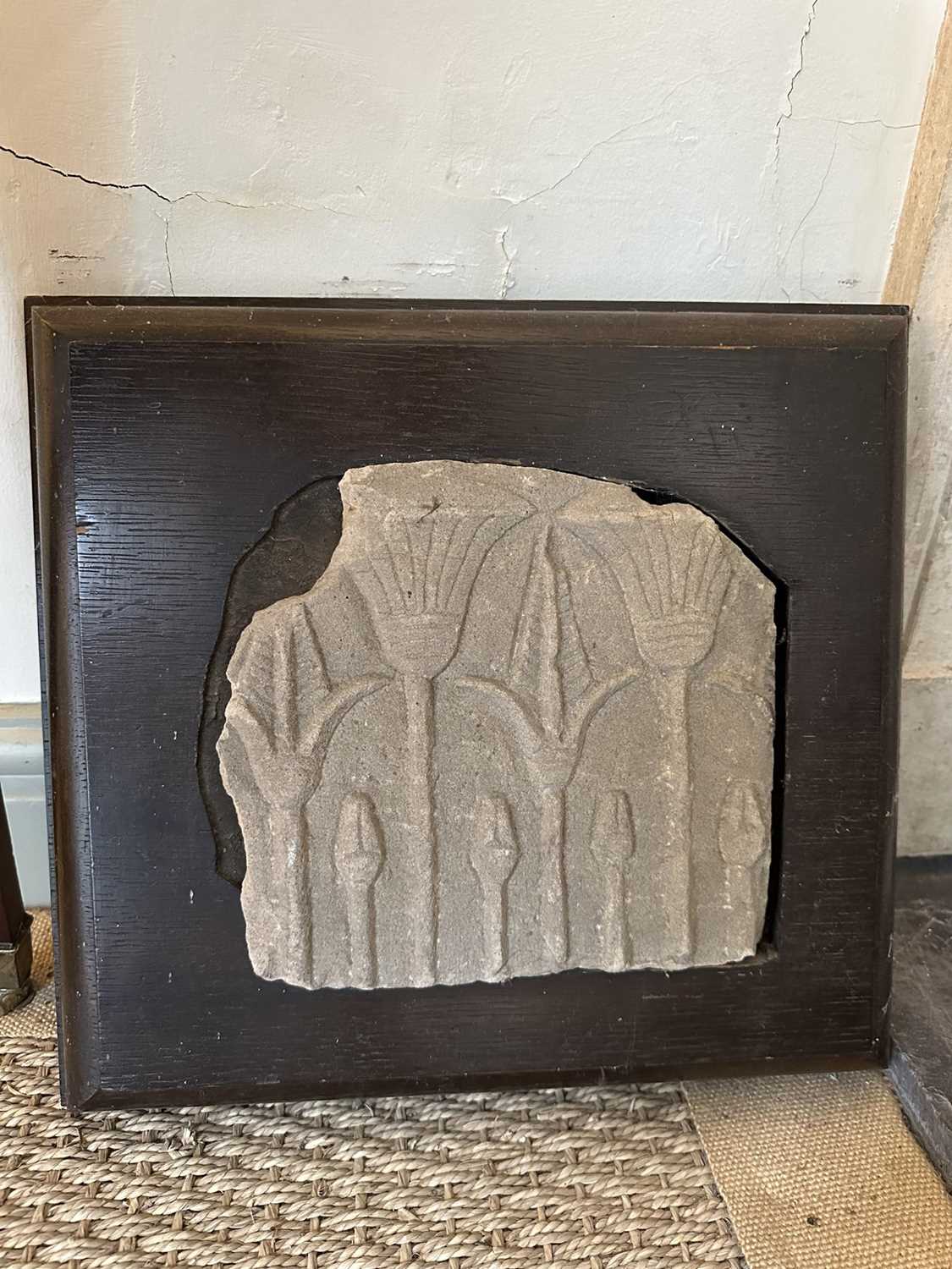 Lot 1593 - Ancient Egyptian stone fragment, presented in an oak frame, 32cm x 35cm Provenance: bought at charity auction at Helmingham Hall in the 1980s