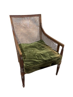 Lot 1617 - William IV mahogany framed library chair with reeded supports, caned back and sides, on fluted tapered legs