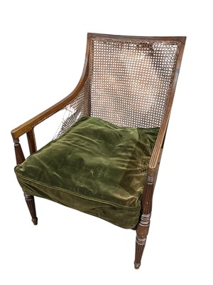 Lot 1617 - William IV mahogany framed library chair with reeded supports, caned back and sides, on fluted tapered legs