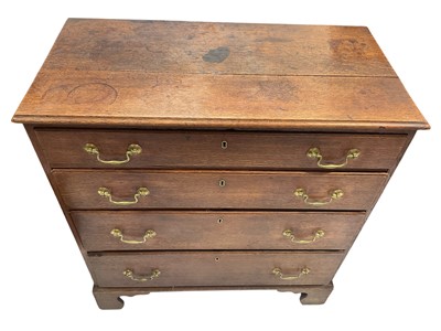 Lot 5264 - George III oak chest of four long drawers, each with original brass handles, 91cm wide x 46cm deep x 97cm high