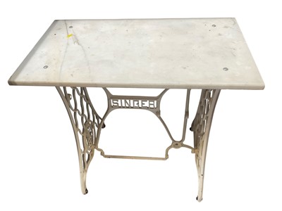Lot 5268 - Marble topped garden table on iron singing sewing machine base, 76cm wide x 41cm deep x 78cm high