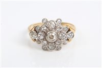 Lot 3481 - Diamond cluster ring, the stylised flower-head...