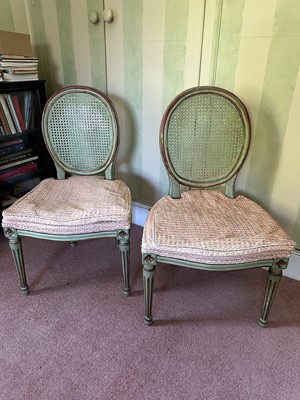 Lot 1702 - Pair of antique green and gilt painted side chairs with oval caned backs, serpentine seats, on fluted legs