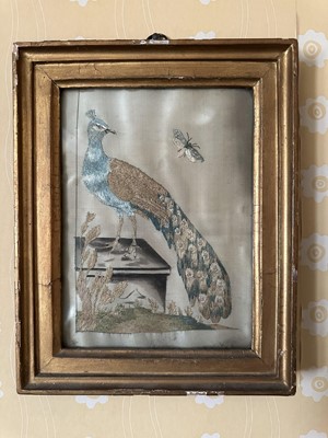 Lot 1742 - Georgian silk work panel depicting a peacock, 25cm x 20cm, in glazed gilt frame