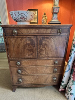 Lot 1753 - George III mahogany commode chest with ebony stringing and brass lion mask handles, on bracket feet