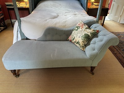 Lot 1757 - Victorian chaise longue with blue upholstered buttoned fabric, on turned mahogany legs nad castors