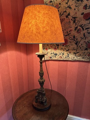 Lot 1769 - Antique Continental carved pricket candlestick, now as a table lamp, with shade
