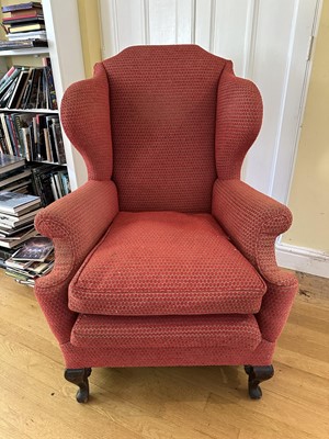 Lot 1800 - Late 19th century wing armchair on turned supports and cabriole legs, upholstered in red fabric