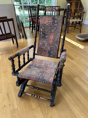 Lot 1802 - 1920s rocking chair, bobbin turned supports with ...upholstery