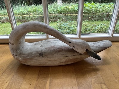 Lot 1806 - Attributed to Guy Taplin (b.1939) painted wooden sculpture in the form of a swan, 81cm long x 33cm high