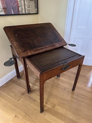 Lot 1808 - Good George III walnut architect's desk, leather-lined rising top, concealed fitted drawer, on chamfered legs and castors