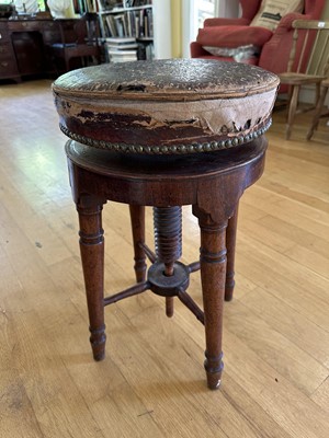 Lot 1819 - Victorian mahogany revolving piano stool with leather top, on turned and tapered legs