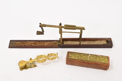 Lot 917 - George III Guinea scales in mahogany box, together with a pair of Georgian sovereign scales