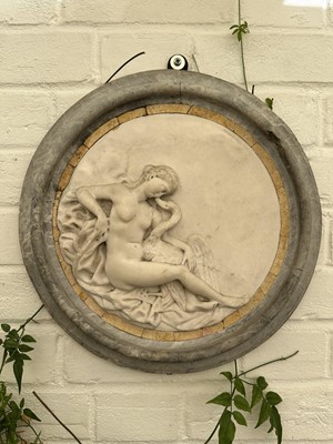 Lot 1860 - Louis XVI white marble relief depicting Leda and the Swan, within a grey marble border, 40cm diameter