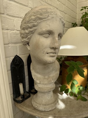 Lot 1864 - Classical style plaster bust, on circular socle, 53cm high