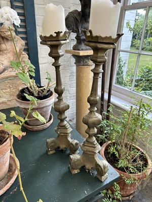 Lot 1866 - Pair of antique brass pricket candlesticks, 47cm high