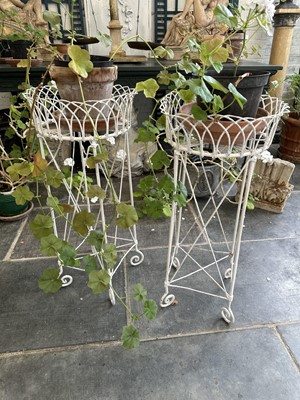 Lot 1871 - Pair of antique wire work plant stands with circular tops, on X-formed supports and scroll feet, 73cm high