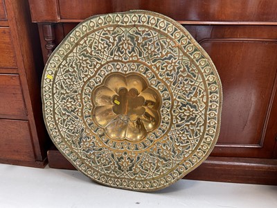 Lot 5180 - Middle Eastern brass table top converted to a wall hanging.