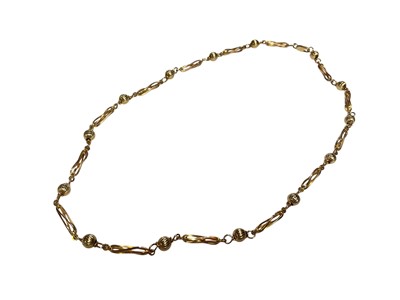 Lot 104 - 9ct gold necklace with alternating gold beads and elongated fancy links, 42cm long
