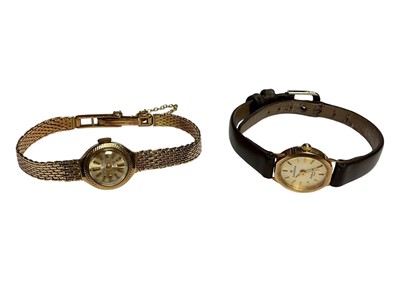 Lot 46 - 9ct gold ladies wristwatch on integral 9ct gold bracelet, together with another 9ct gold cased wristwatch on leather strap (2)