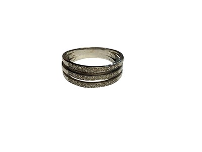 Lot 6 - 9ct white gold diamond set five band ring