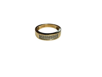 Lot 7 - 9ct gold diamond ring with two rows of princess cut diamonds in a channel setting, estimated total diamond weight 0.50cts