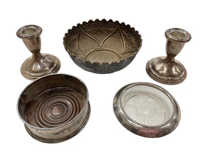 Lot 1004 - Pair of sterling silver candlesticks, silver wine coaster, silver mounted glass dish and a silver (925) bowl