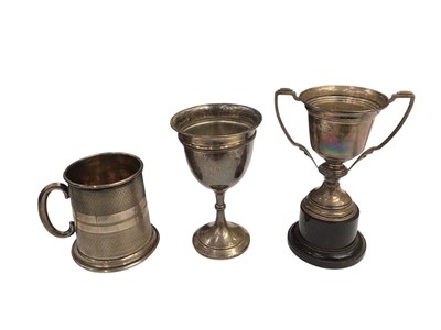 Lot 1039 - Two silver trophies and christening mug (3)