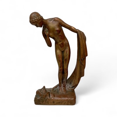 Lot 5037 - An Art Deco style ceramic figure of a nude woman holding drapery, signed Stella