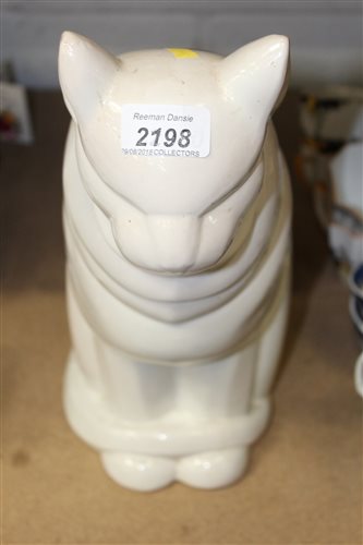 Lot 2198 - French Art Deco pottery figure of a cat in the...